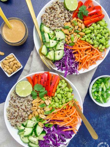 This vibrant Asian Quinoa Bowl & Peanut Dressing is loaded with fresh ingredients and tossed with a ginger-garlic homemade peanut dressing.  You will love how easy it is to prepare and makes a great lunch, picnic or side dish.  