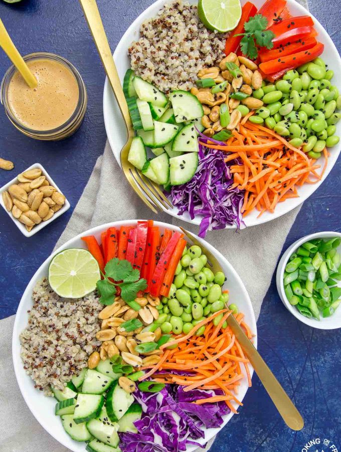This vibrant Asian Quinoa Bowl & Peanut Dressing is loaded with fresh ingredients and tossed with a ginger-garlic homemade peanut dressing. You will love how easy it is to prepare and makes a great lunch, picnic or side dish.