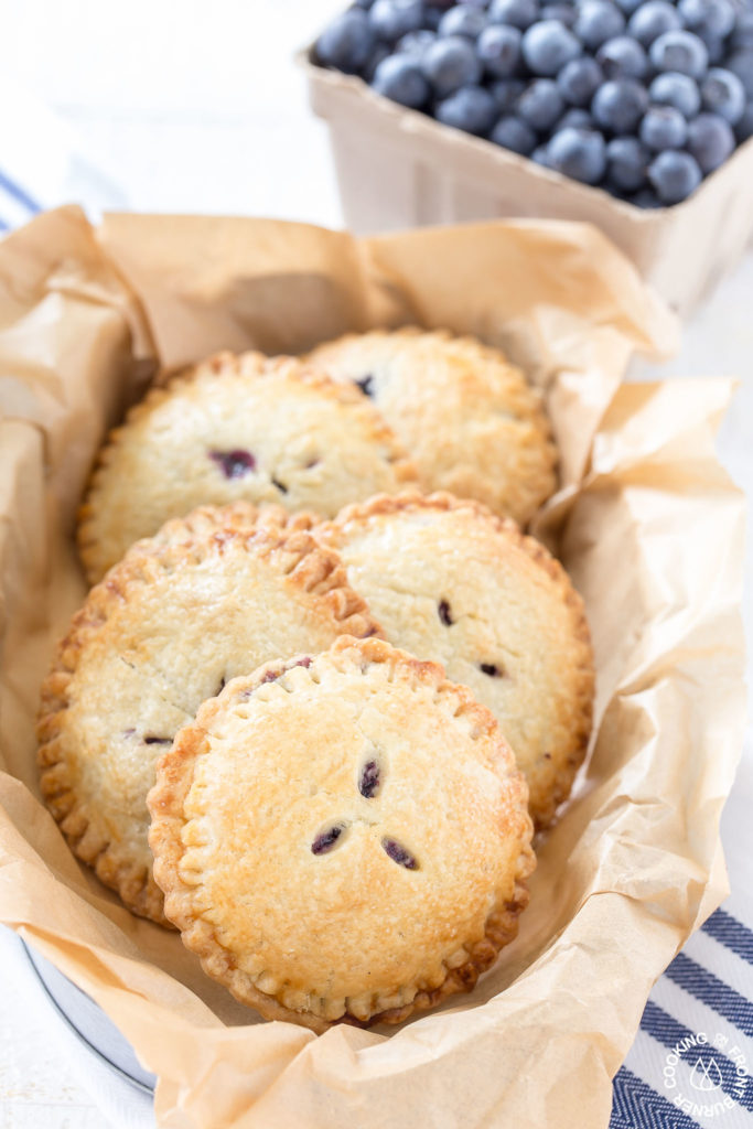 Blueberry hand pies in a basket
