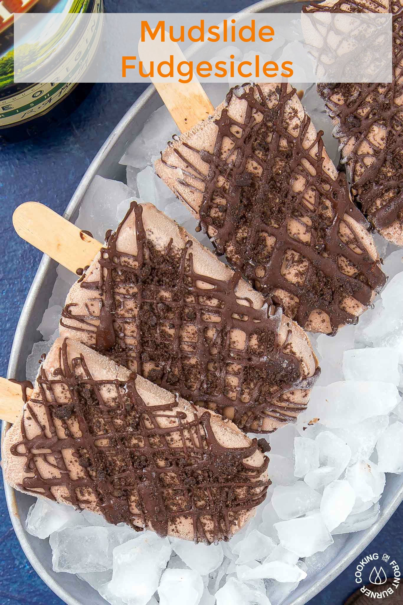 The adult crowd will enjoy these Mudslide Fudgesicles that will remind them of their favorite kid treat with the addition of some Bailey's Irish Cream. This creamy popsicle is easy to make and a great after dinner treat. #fudgesicle #summer #easy #frozen #baileys #irishcream