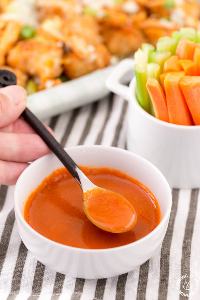 homemade buffalo sauce in a dish