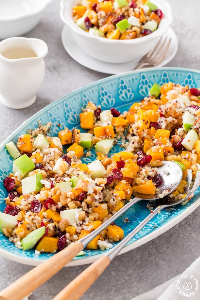 serving utensils on a salad plate