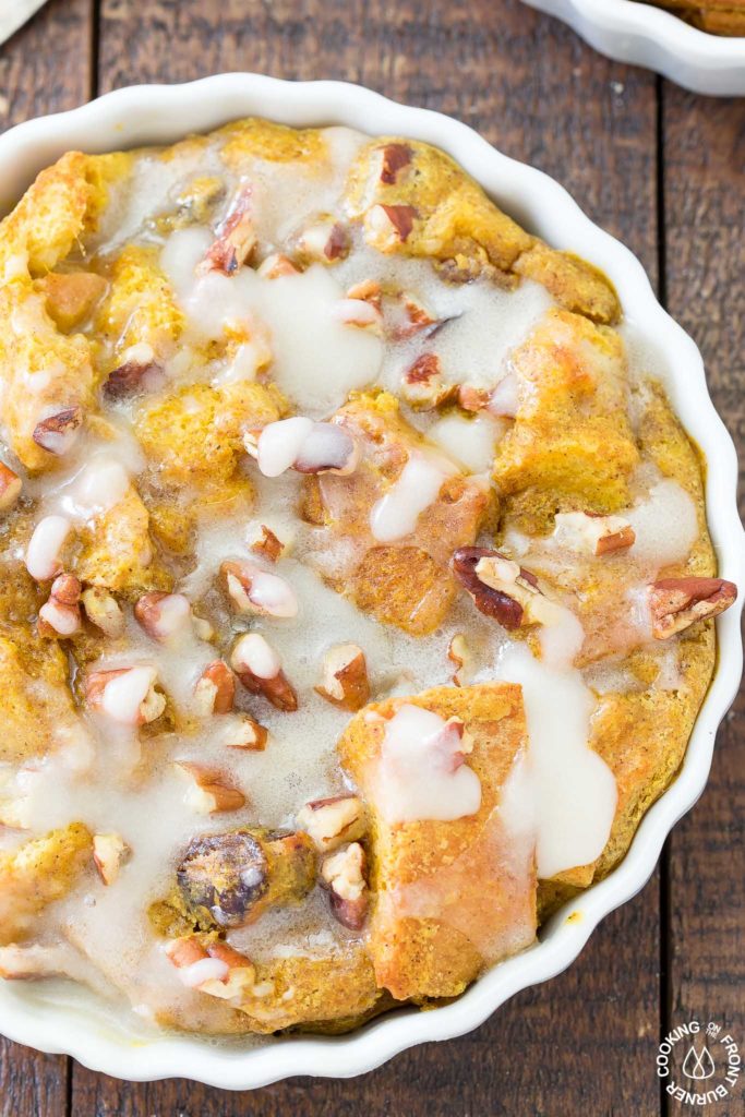 overhead view of pumpkin spice breading pudding in a baking dish