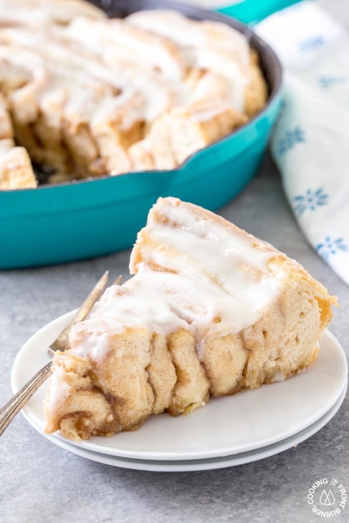 a slice of pumpkin spice skillet rolls on a plate