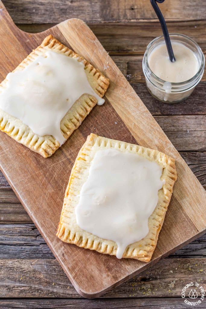 2 pumpkin pie pop tarts on a board