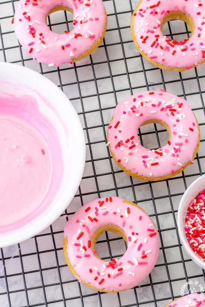 baked vanilla donuts on a cooling rack