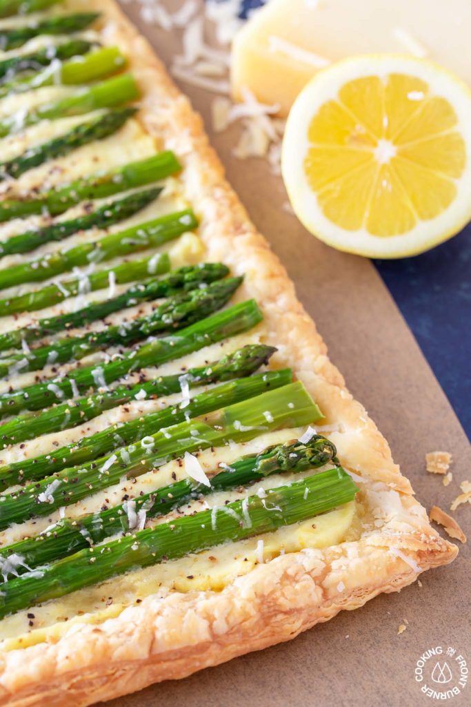 close up shot of asparagus tart on parchment paper