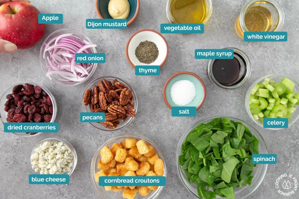 a picture will all ingredients needed to make spinach salad with maple vinaigrette dressing