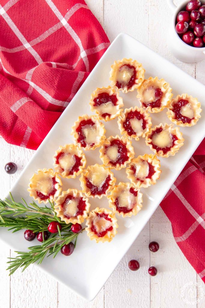 a platter of cranberry orange brie tarts