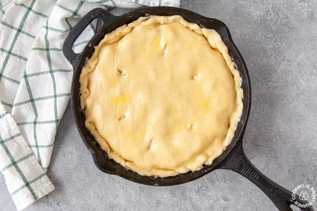 unbaked chicken pot pie in a skillet 