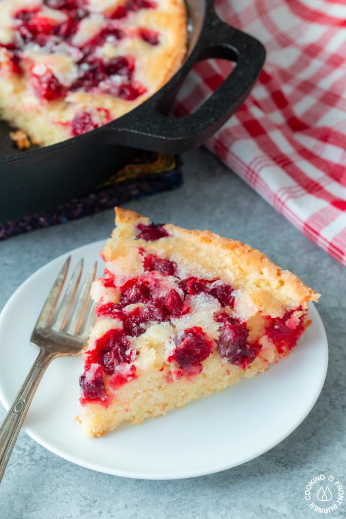 a slice of cranberry bread on a plate