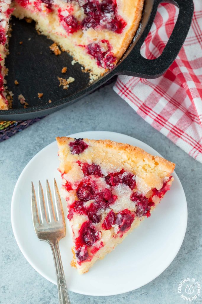 a slice of cranberry skillet bread on a plate
