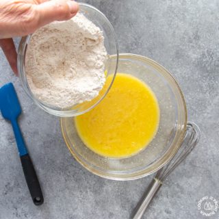 combining dry ingredients with wet for cranberry skillet bread