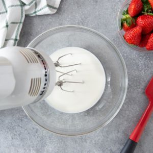 mixer beating whipped cream