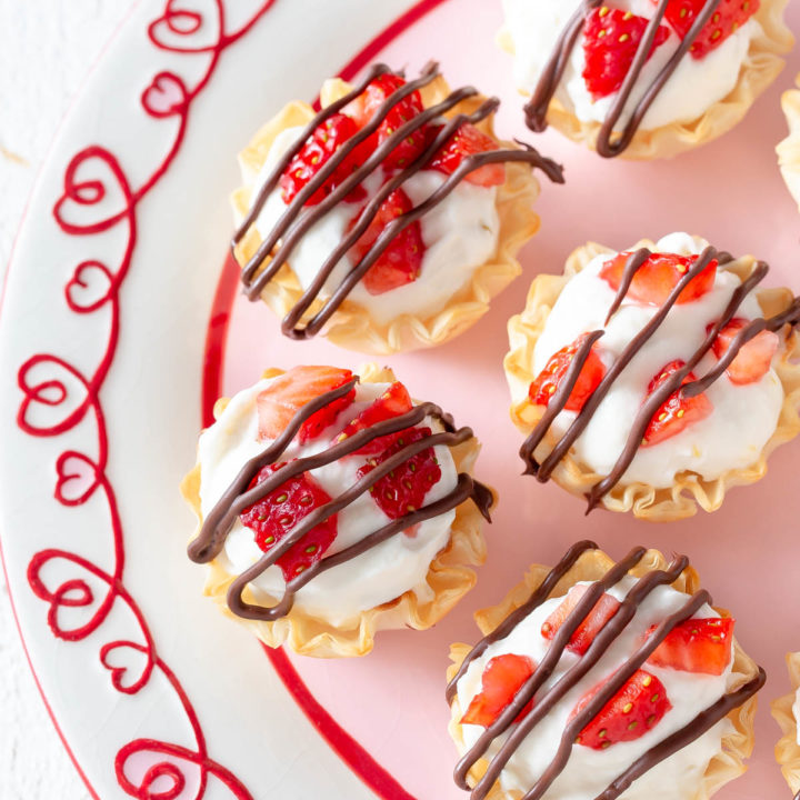 strawberry cheesecake phyllo cups on a plate