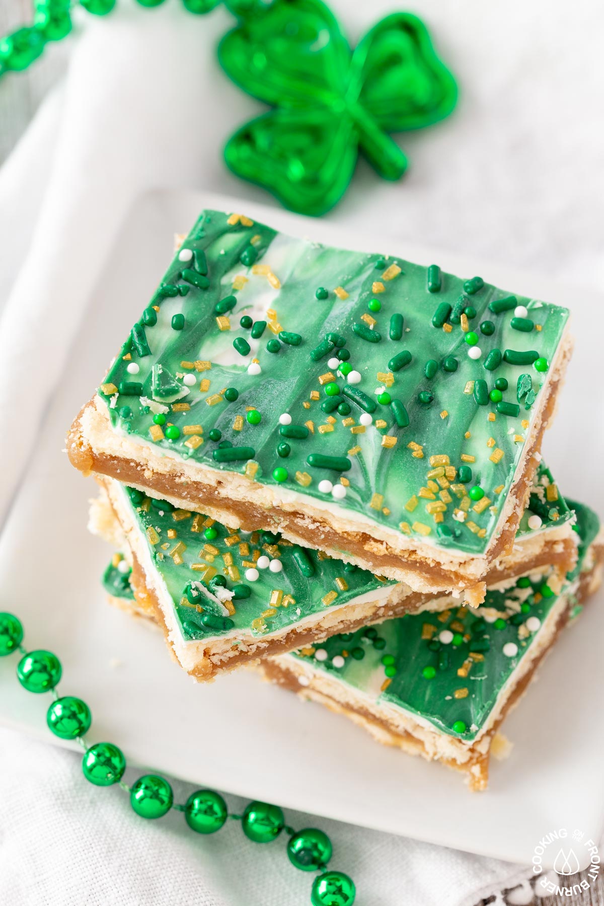 A plate with st patrick club cracker bars on it