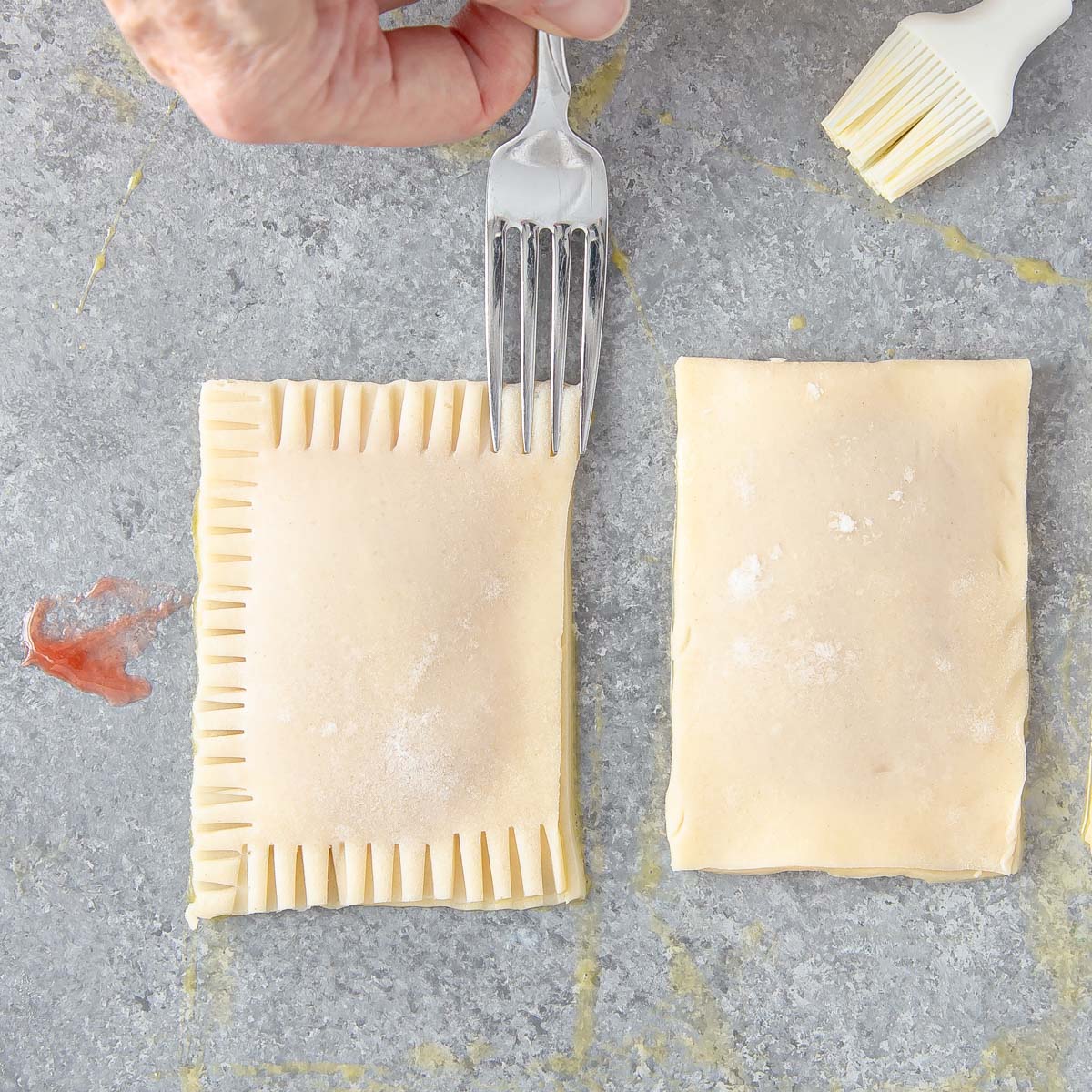crimping edges of pie crust with a fork to make pop tarts