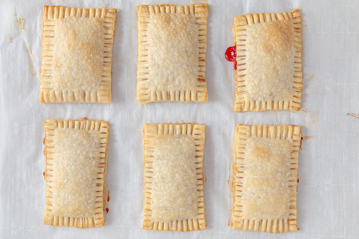 baked pop tarts on a cookie sheet