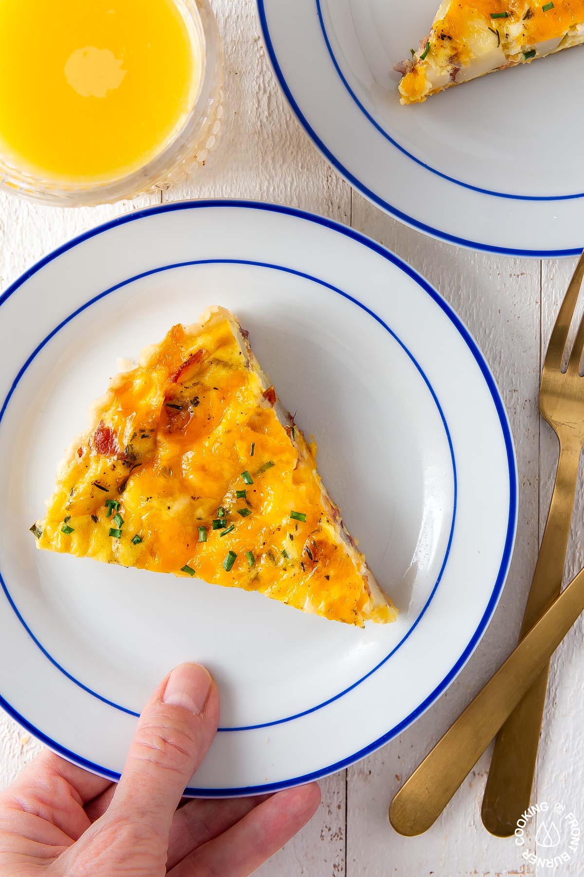 a slice of loaded baked potato quiche on a plate