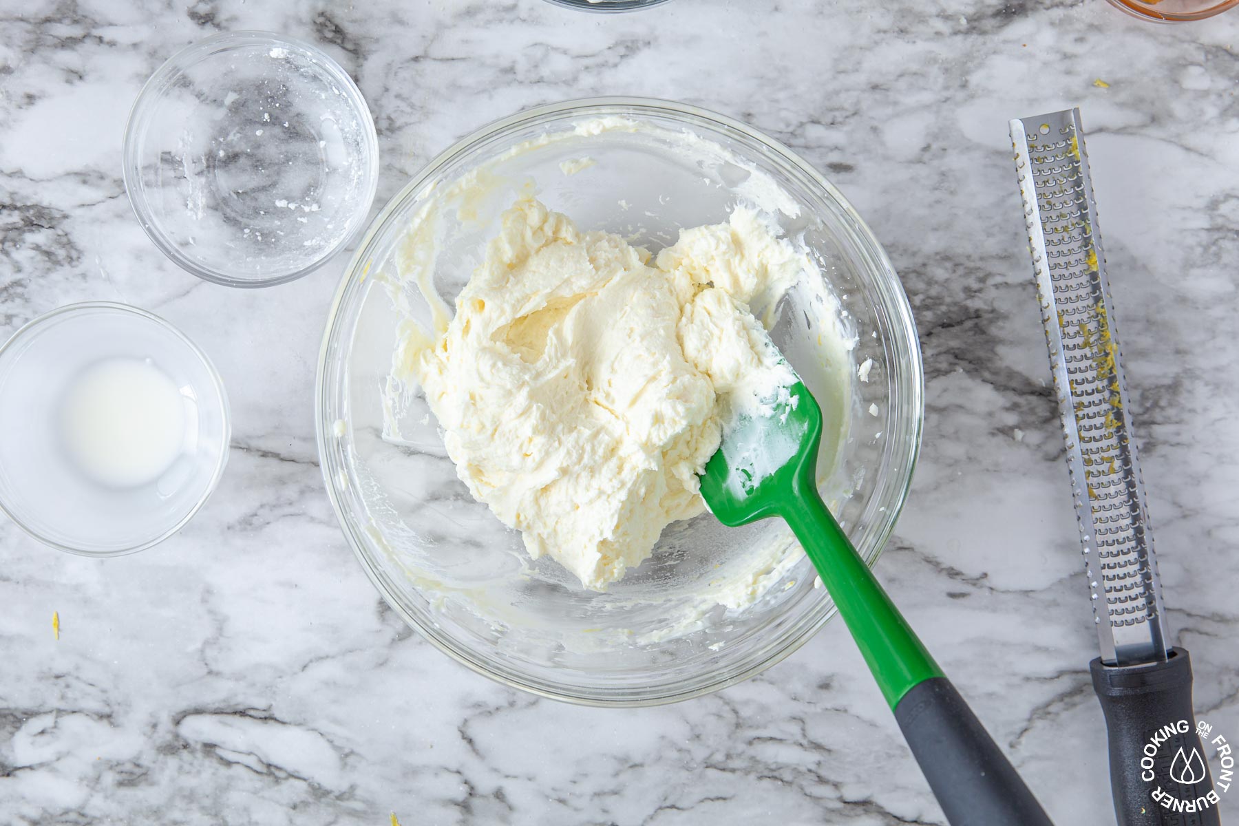 a bowl of creamy mascarpone cheese lemon filing