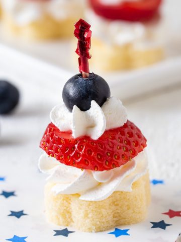 one mini strawberry pound cake bite on a napkin