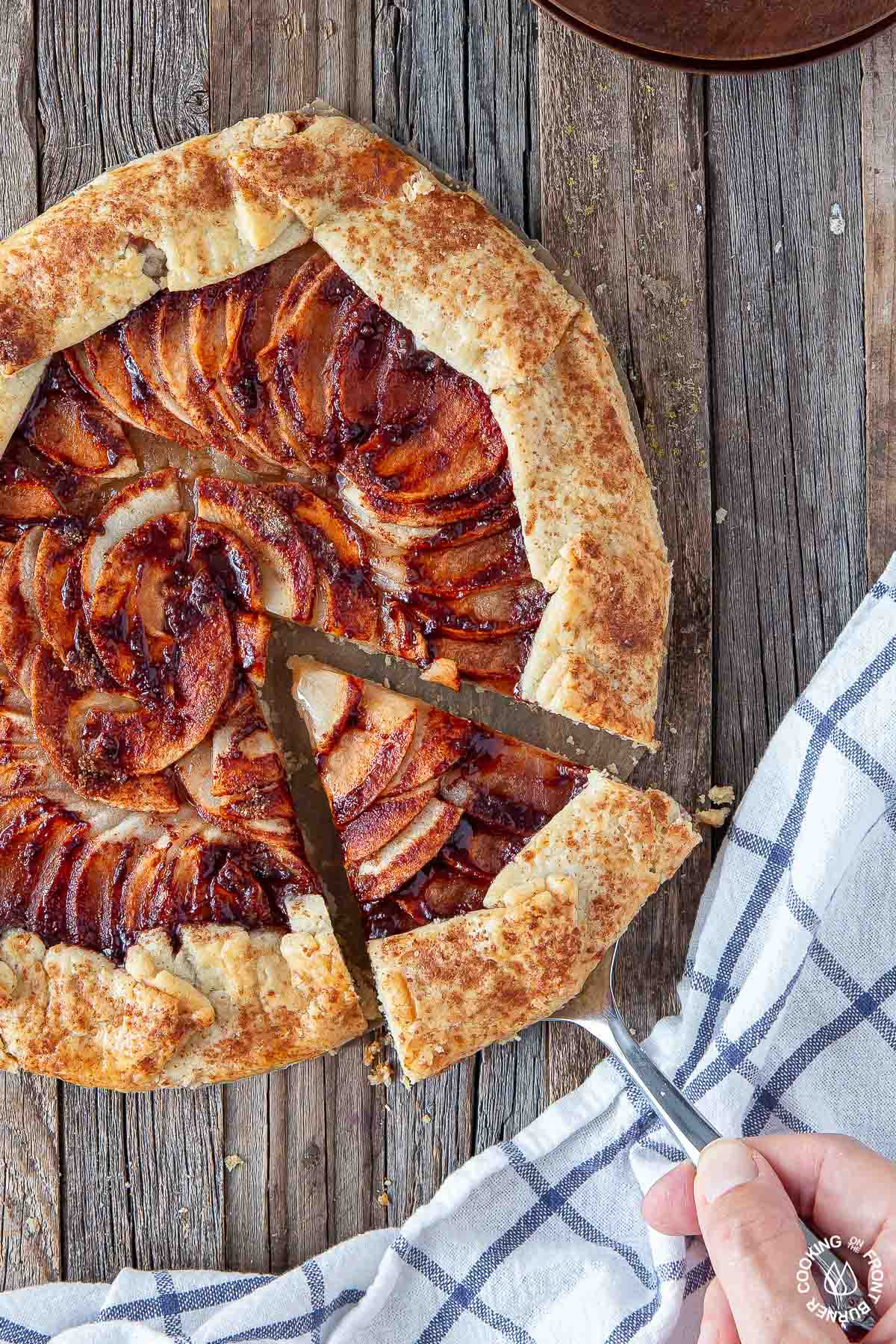 rustic apple galette with a slice cut out 