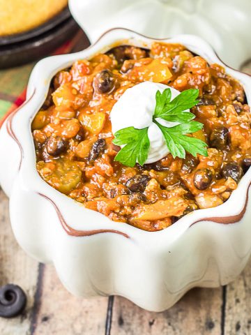 turkey pumpkin chili in a white pumpkin bowl