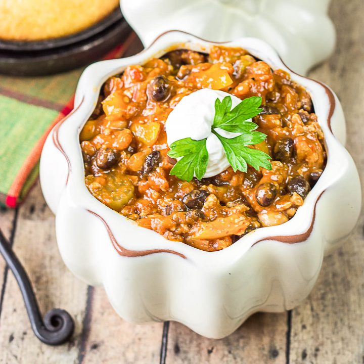 turkey pumpkin chili in a white pumpkin bowl