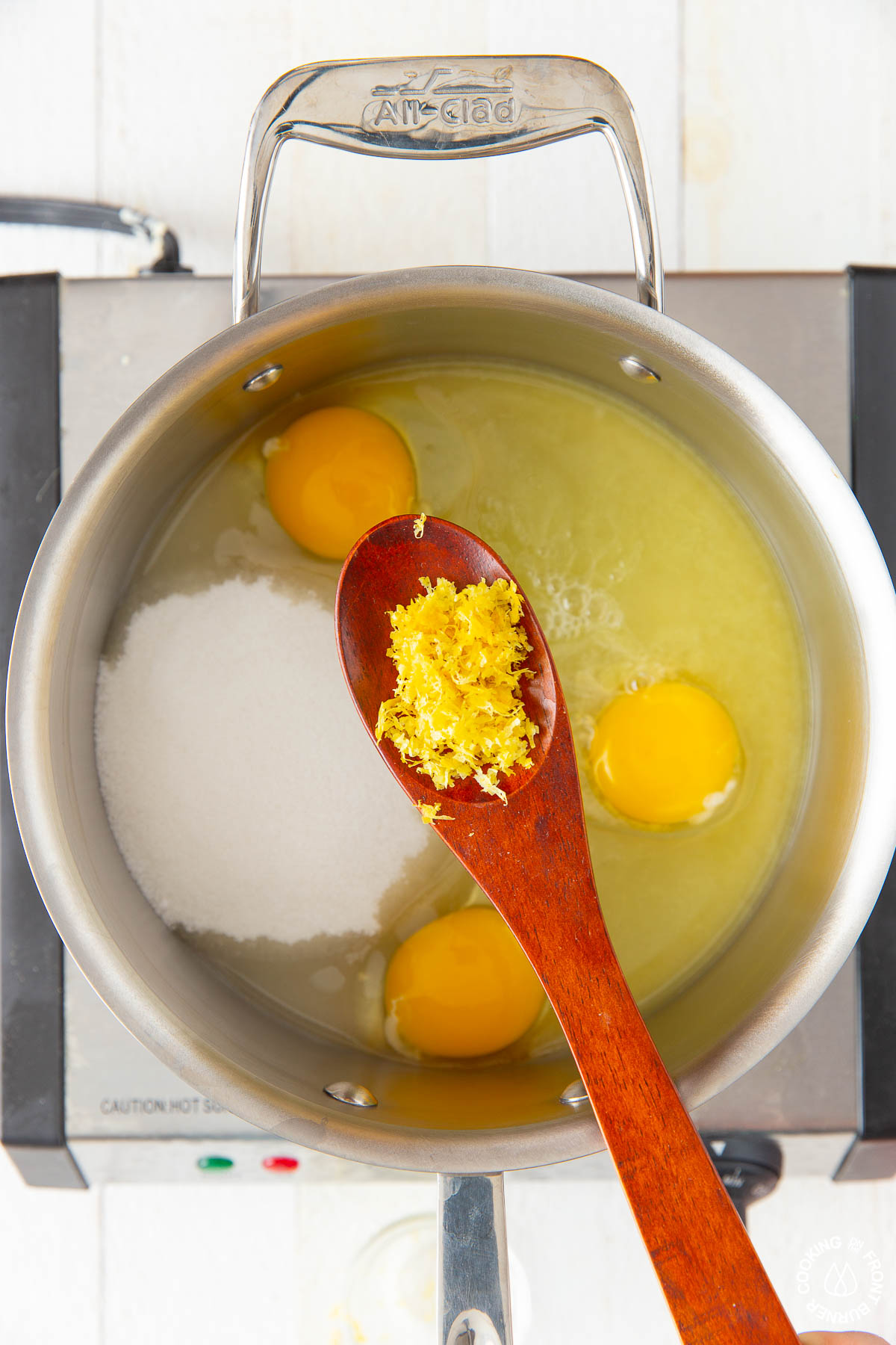 saucepan with sugar, lemon juice, lemon zest, eggs