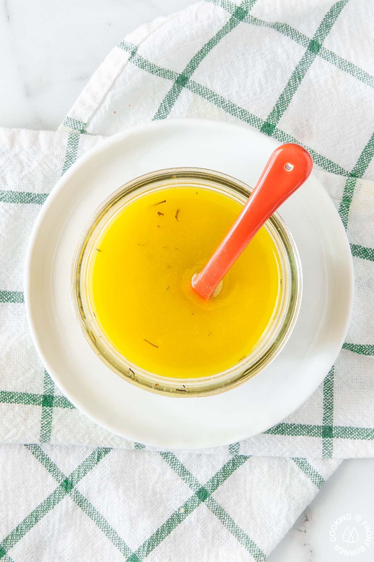 maple vinaigrette dressing in a bowl with spoon