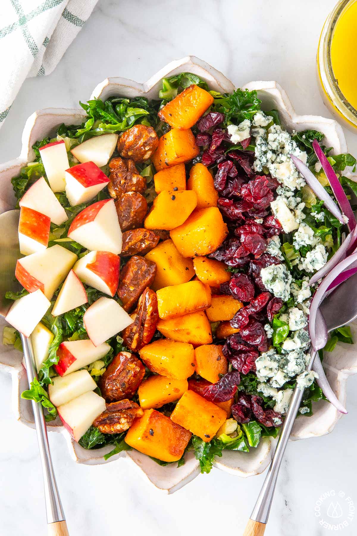 kale brussels sprout salad in white bowl