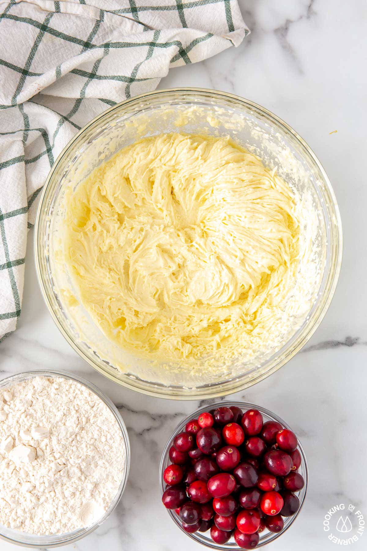 clear bowl with a egg sugar butter miixture