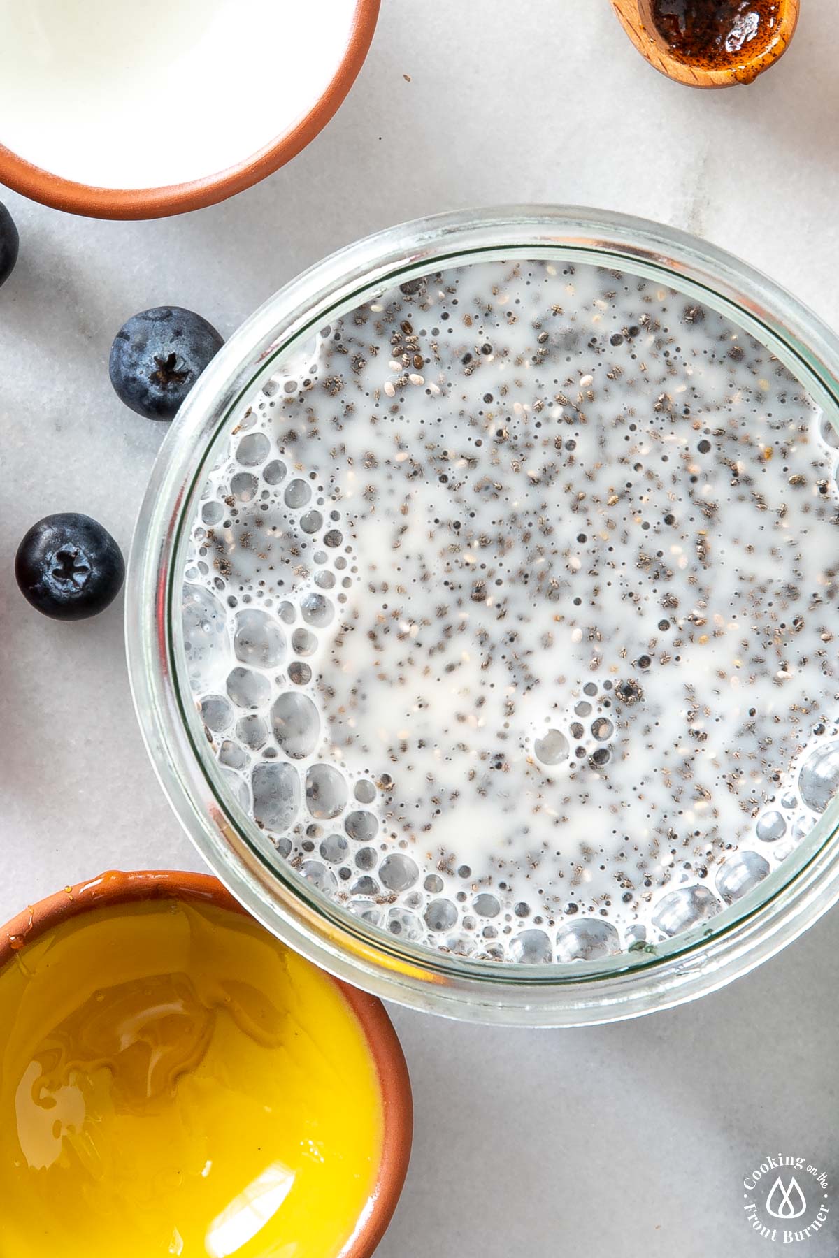 a bowl with almond milk combined with chia seeds