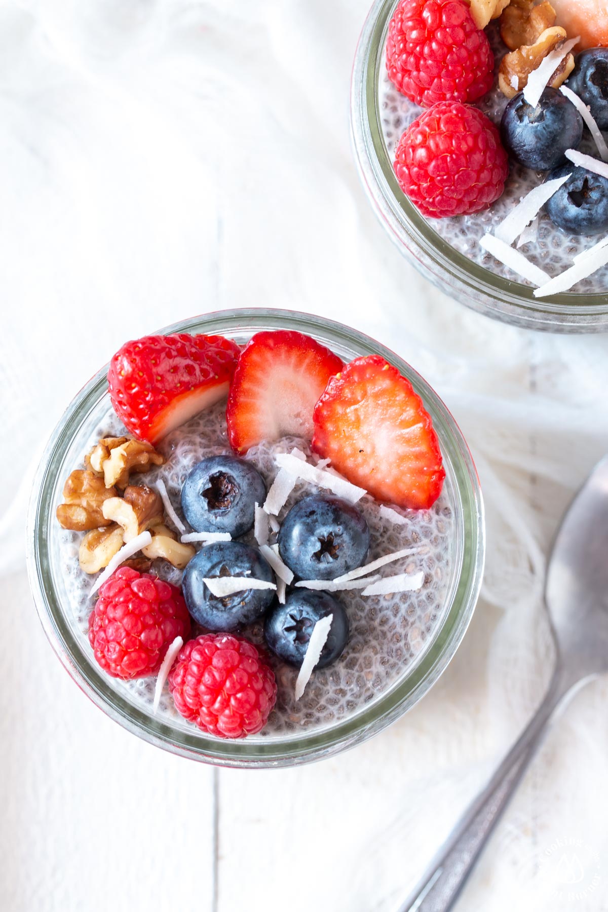 overhead shot chia pudding with fruit on top