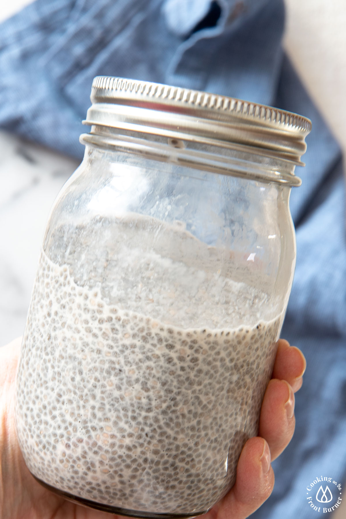 chia pudding in a glass canning jar