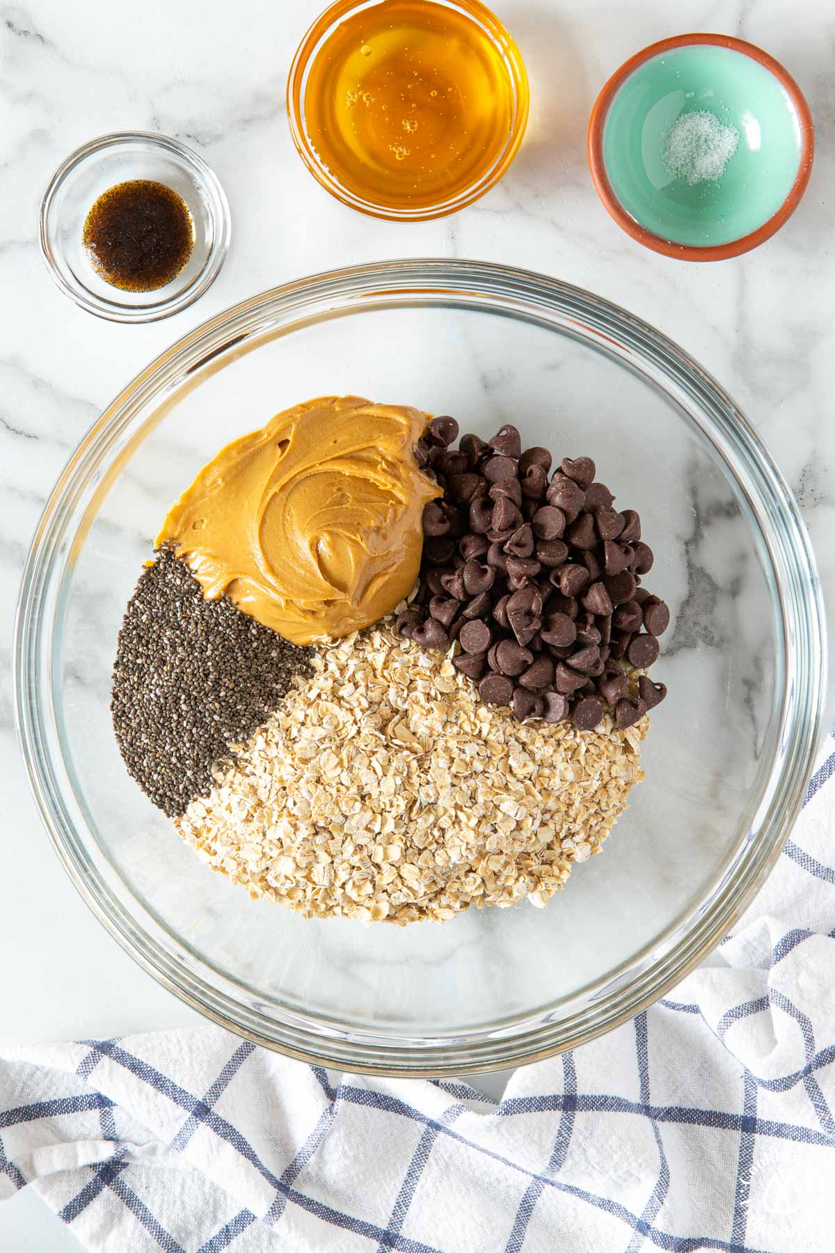 bowl with oats, chocolate chips, peanut butter chia seeds