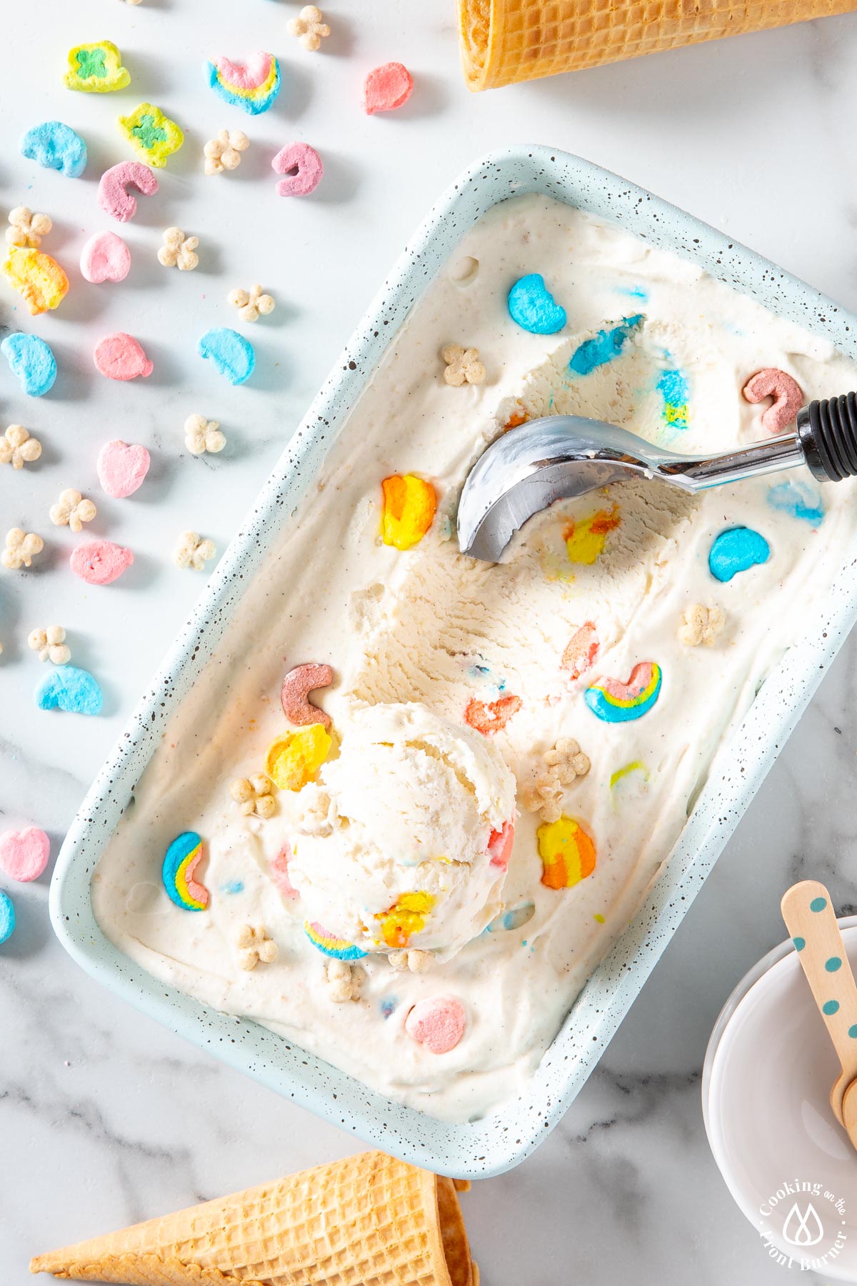 loaf pan with ice cream with one scoop on top