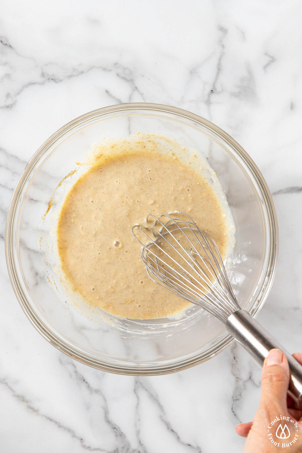 whisked ingredients in a clear bowl