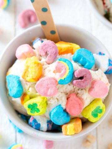 ice cream in a bowl with lucky charms on top