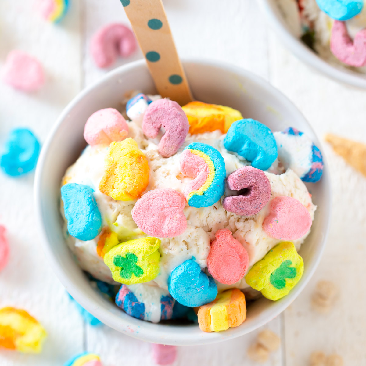 ice cream in a bowl with lucky charms on top