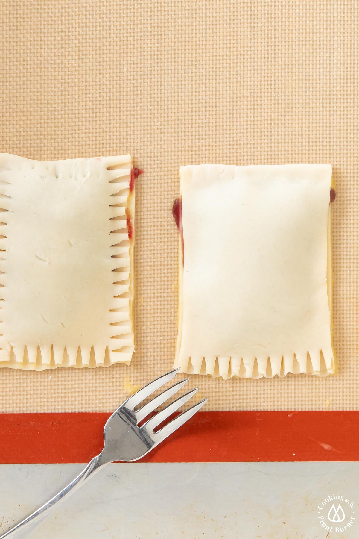 crimping edges of pop tarts with a fork