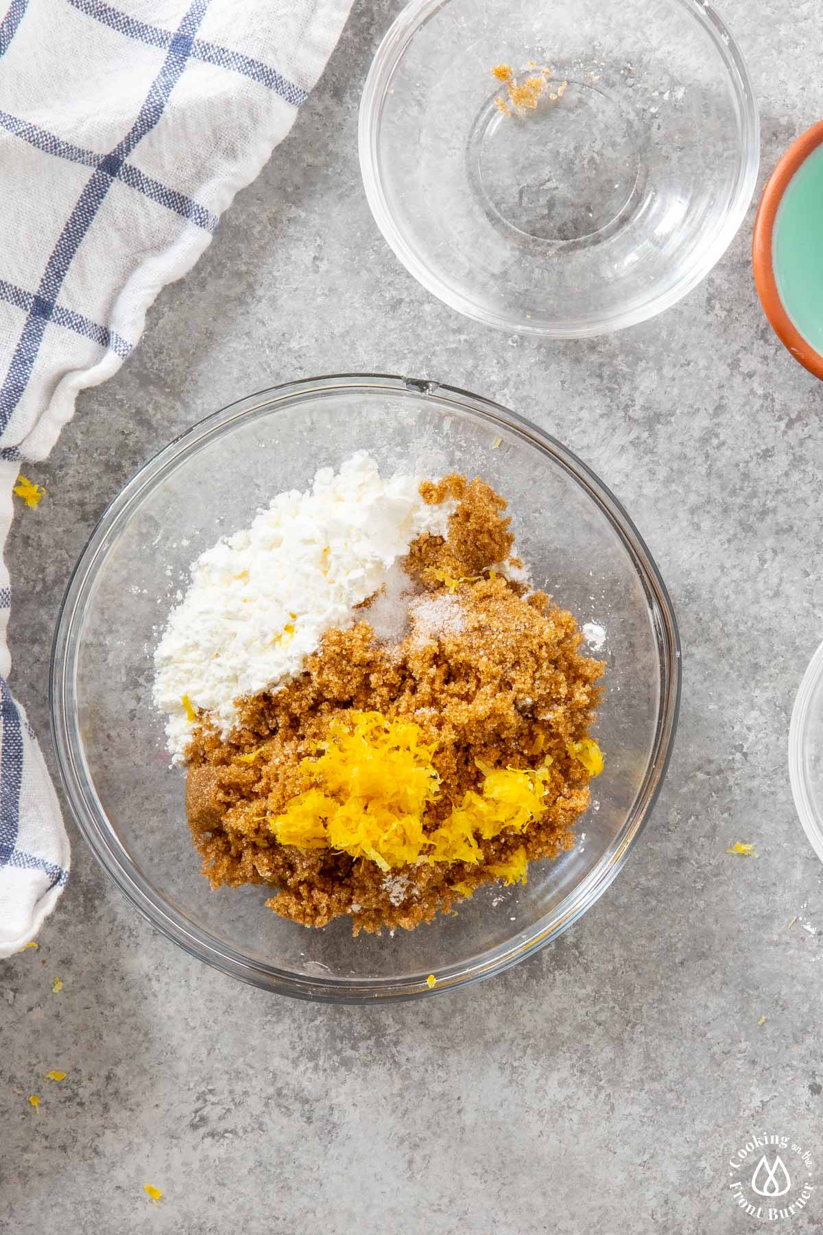 clear bowl with cornstarch, brown sugar, lemon zest