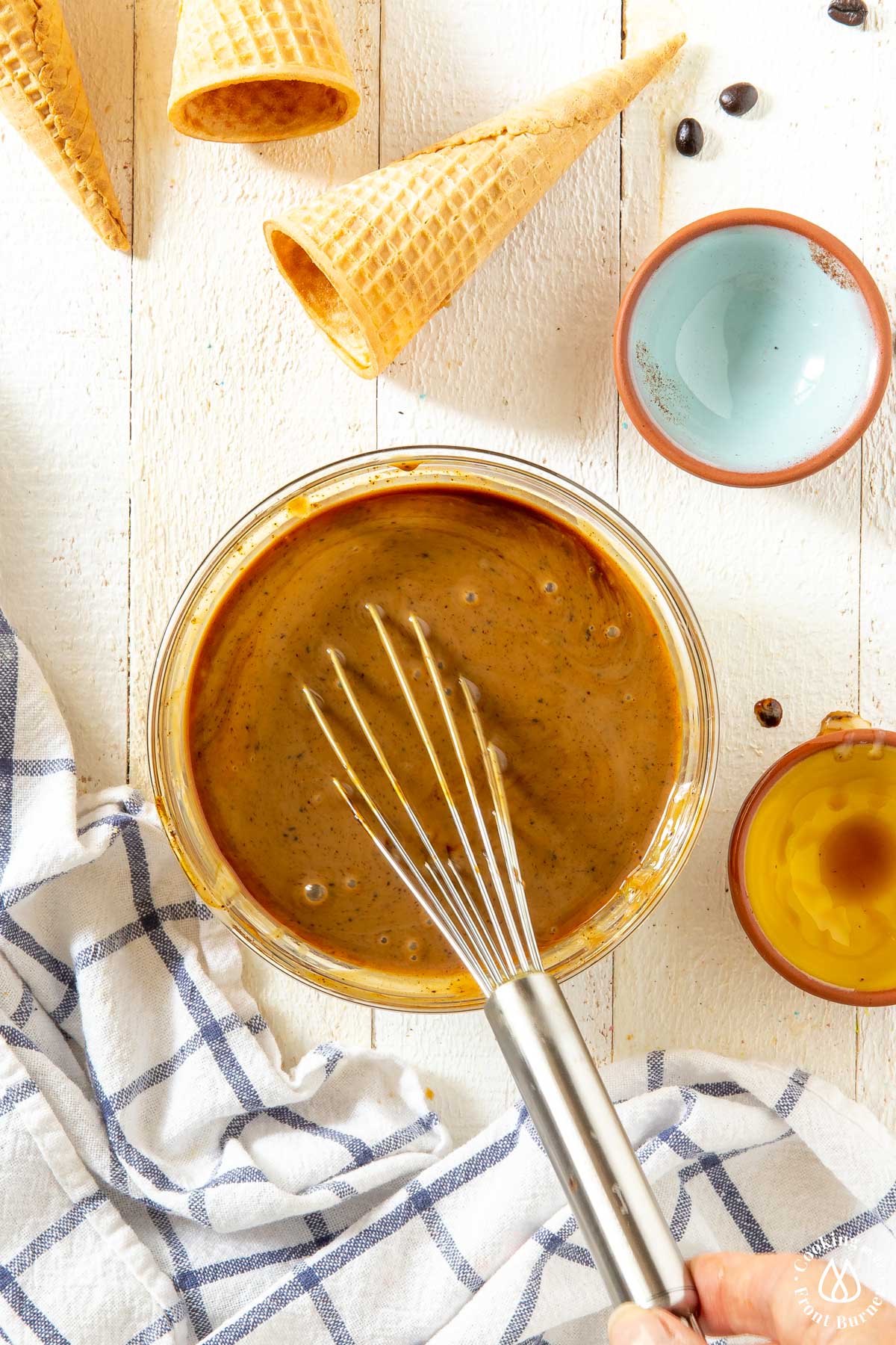 clear bowl with a combined coffee base ice cream mixture