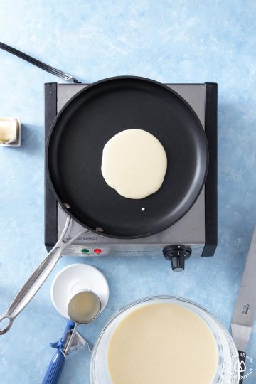 crepe batter in center of pan