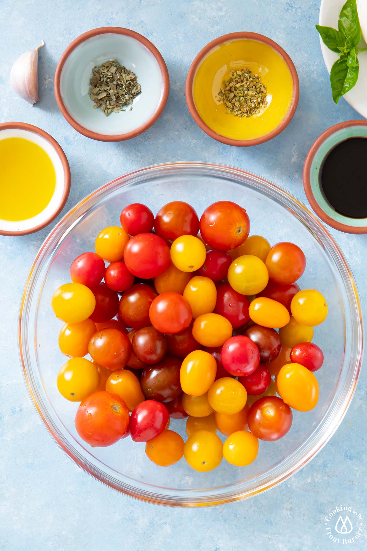 clear bowl with colored small tomatoes